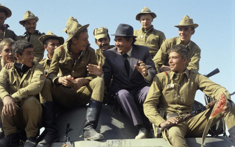 “Soviet Army soldiers return from Afghanistan”. Soviet soldiers welcomed by a local resident upon their return from Afghanistan.