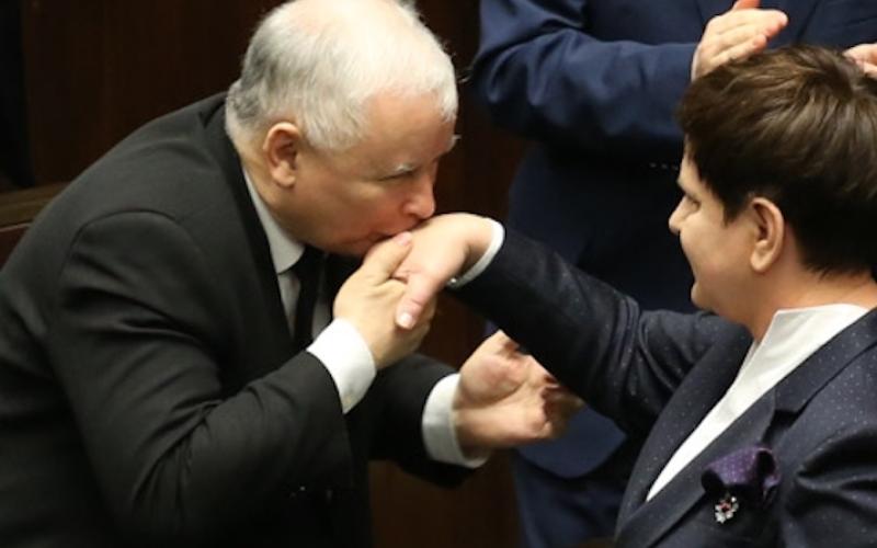 Jarosław Kaczyński kissing Beata Szydło's hand after her expose in Sejm