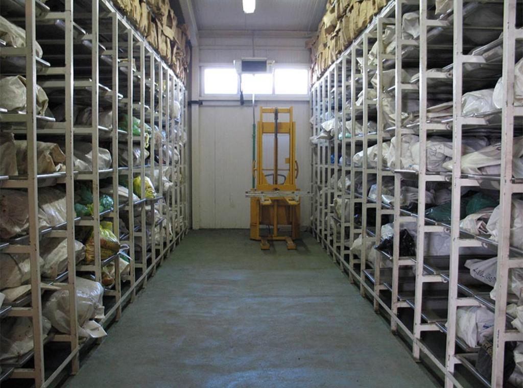 <p lang="de" style="margin: 0in; font-family: Calibri; font-size: 11.0pt;">ICMP's Podrinje Identification Project (PIP) was formed to deal with the identification primarily of victims of 1995 Srebrenica massacre. PIP includes a facility for storing, processing, and handling exhumed remains. Much of the remains are only fragments or commingled body fragments since they were recovered from secondary mass graves. The photo depicts one section of the refrigerated mortuary, Jasmin A., 2007, Wikimedia Commons, Pu