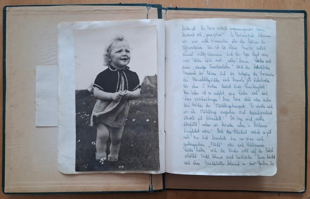 Page of the album of Natali’s mother with a photo of her mother and a written testimony by Natali’s grandfather.