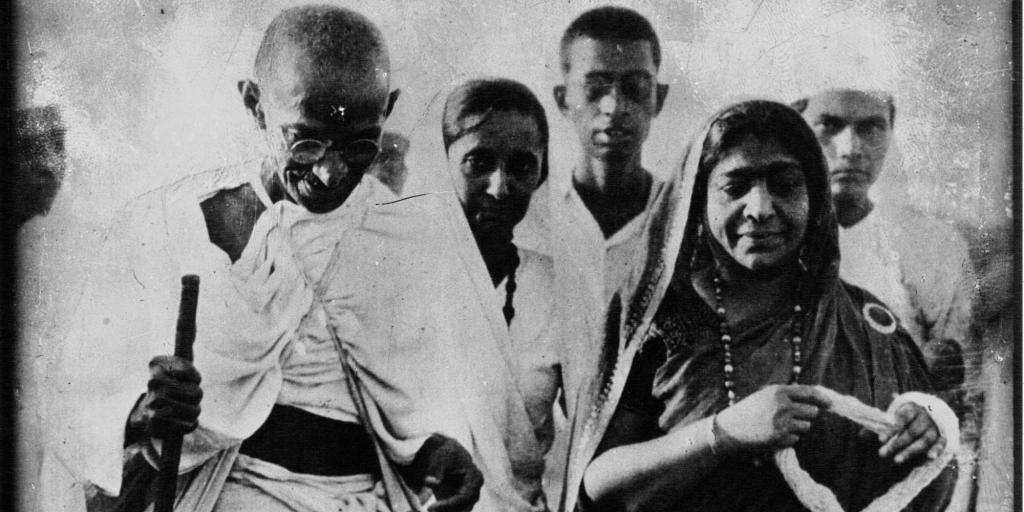 Gandhi and Mrs Sarojini Naidu. Picture taken during the Salt March.