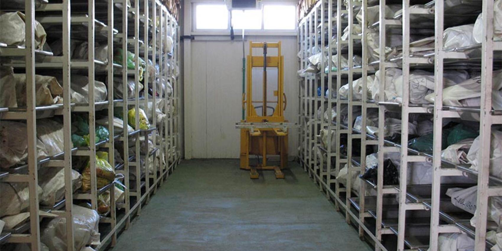 <p lang="de" style="margin: 0in; font-family: Calibri; font-size: 11.0pt;">ICMP's Podrinje Identification Project (PIP) was formed to deal with the identification primarily of victims of 1995 Srebrenica massacre. PIP includes a facility for storing, processing, and handling exhumed remains. Much of the remains are only fragments or commingled body fragments since they were recovered from secondary mass graves. The photo depicts one section of the refrigerated mortuary, Jasmin A., 2007, Wikimedia Commons, Pu