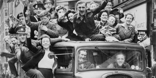 Ve Day Celebrations in London, 8 May 1945, A truck of revellers passing through the Strand, London